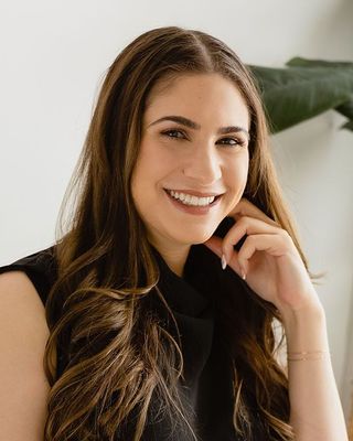 Photo of Denise Taher, Registered Psychotherapist, RP, MA, MSc