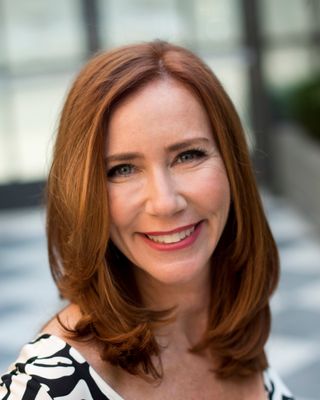 Photo of Dr. Julie Shuman, Psychologist, PsyD, PCC, EFCT