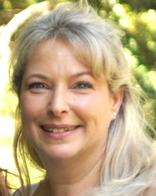 Photo of Dr. Julie Abraham Psychotherapist, M.D. in West Harrison, NY