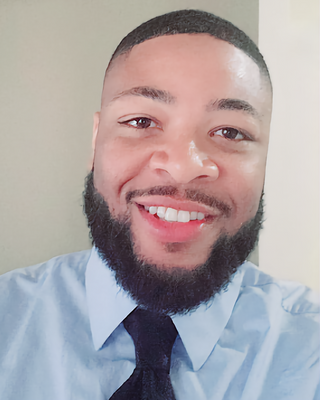 Photo of Shawntrell Moore, Counselor, MA, LCPC, CADC