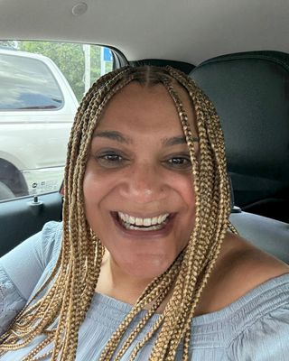 Photo of Aariom Misleh, Licensed Professional Clinical Counselor, PCC