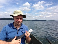 Gallery Photo of Dr. Wolf Shipon, our practice owner and director, playing an Outdoor Ukulele on Lake Wallenpaupack in 2014. Dr. Shipon now lives on Lake Parsippany.