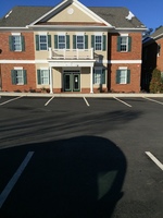 Gallery Photo of Balance & Potential Inc is across this parking lot in Suite 79