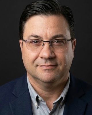 Photo of Adam C Dollen, Counselor, LMHC, NCC