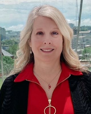 Photo of Laura Oliva, Licensed Clinical Professional Counselor, LCPC, RPT, MS