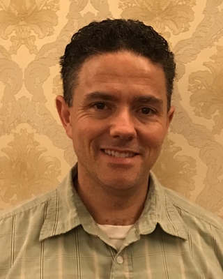 Photo of Benjamin Crawford, Psychiatrist in 20176, VA