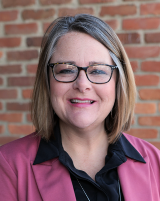 Photo of Ami Olinger, Counselor, LPCC