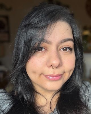 Photo of Athena Kouspidis, MHC-LP