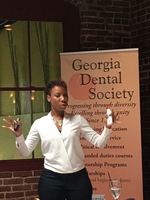 Gallery Photo of Dr. RJ training Georgia's best dentists on self-care and burnout prevention