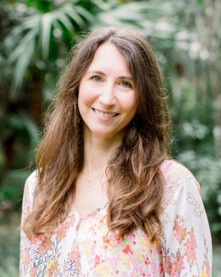 Photo of Claira Ford, LPC, LMHC, RPT™