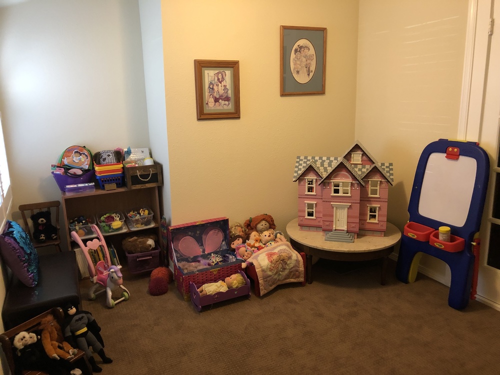Our playroom provides a safe space for children to discuss their feelings using such therapy aids as arts & crafts, puppets and costumes for dress up.