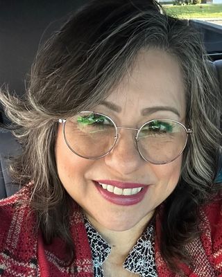 Photo of Milca Ruiz Manzo, Clinical Social Work/Therapist, MSW, LICSWA