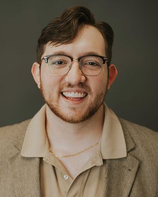 Photo of Harrison Ta-Smith, Counselor, LMHC
