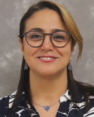 Photo of Khedidja Hmamad, Registered Psychotherapist, EdD, MEd, CRPO, CCPA