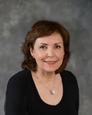 Photo of Dina Amouzgar, MA, RCC, Counsellor