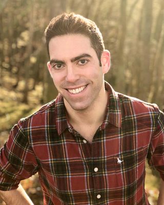 Photo of Zach Udko, Counselor, LMHC, MFA, MA