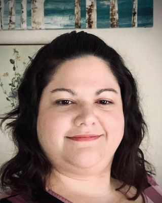 Photo of Brittany Cannioto, Licensed Mental Health Counselor, LMHC, QS
