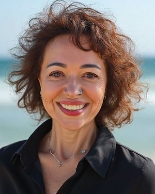 Photo of Claudia Almeida, Psychiatric Nurse Practitioner, PMHNP, -BC