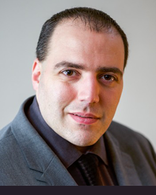 Photo of John Dolores, Psychologist, LCP