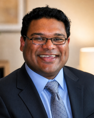 Photo of Claude Murugen, Psychiatrist, MD