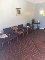 Gallery Photo of I will come out to get you from the waiting room where  you can relax and have something to drink .