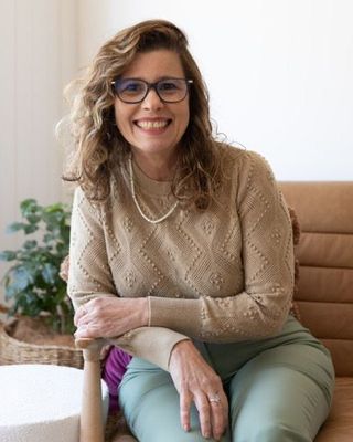 Photo of Claudiana Arteiro, Social Worker, AMHSW