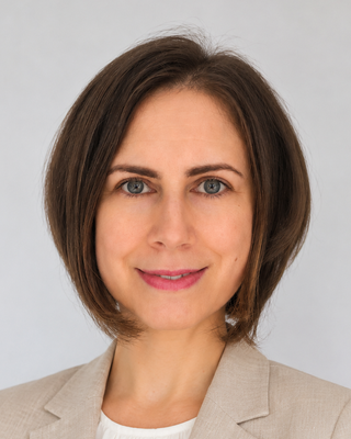 Photo of Poliana Mihaela Aniculaesei, Psychotherapist, MA, MIACP