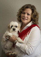 Gallery Photo of Pam and Sophie, our mascot and theapy dog.