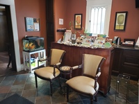 Gallery Photo of Waiting area. Make yourself comfortable with an array of refreshments, and friendly fishes
