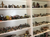 Gallery Photo of Shelves of Sandplay miniatures.
