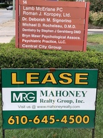 Gallery Photo of Signs in front of building