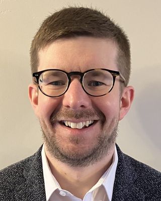 Photo of Dr Alex Brooks, Psychologist, PsychD, HCPC - Clin. Psych.