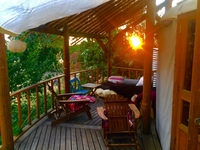 Gallery Photo of The deck of the Arco Iris yurt, where we sometimes meet with clients.