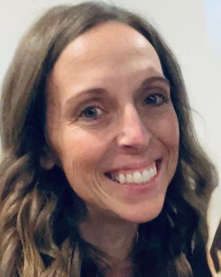 Photo of Dr. Cami Lerminez, Counselor, PsyD, LCPC, LMHC
