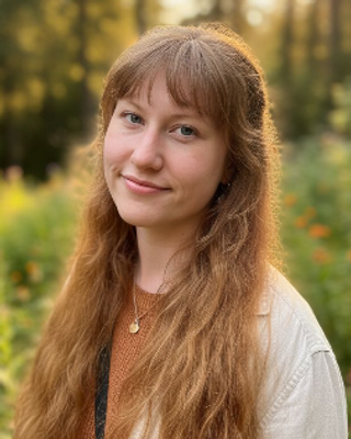 Photo of Rebecca Richardson, Licensed Professional Counselor, LPC, R-DMT, LMHC, CCTP