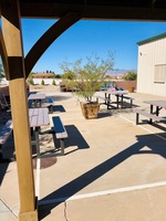 Gallery Photo of Red Hawk campus back patio.
