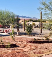 Gallery Photo of Red Hawk campus nature walkway and low ropes course.