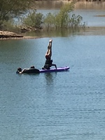 Gallery Photo of Paddle board yoga.