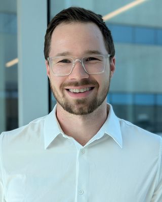 Photo of Michael Szymanski, Registered Psychotherapist (Qualifying), MA, RP(Q), RN