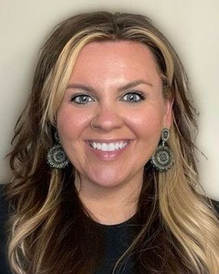 Photo of Dr. Emily DuBach, Counselor, LCPC, PhD, ATR-BC