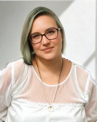 Photo of Caitlin Gilbert, Registered Psychotherapist (Qualifying), MA, RN