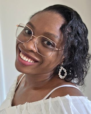 Photo of Promise Echujie, Pre-Licensed Professional
