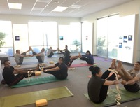 Gallery Photo of Teaching Yoga at Office for 10+ years to improve emotional and physical wellbeing of employees and create stronger sense of connection as a team.
