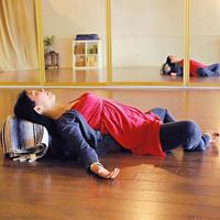 Gallery Photo of Yoga Therapy Example: Reclining Bound Angle Pose can relieve the symptoms of stress and mild depression and restore physical and emotional energy.