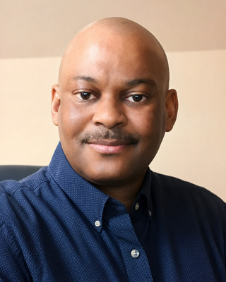 Photo of Ik McPaul, Psychiatric Nurse Practitioner, DNP