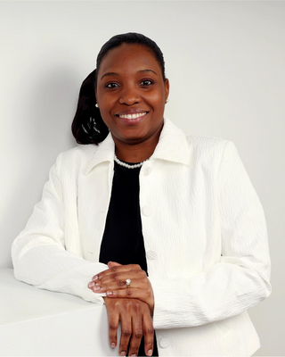 Photo of Medgyne Dumé, Registered Psychotherapist (Qualifying), MEd, RP