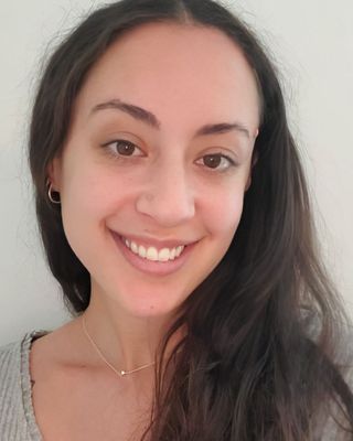 Photo of Violet Fludzinski, Counselor, MA, LMHC