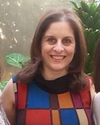 Photo of Justine Scarinzi, Licensed Mental Health Counselor, LMHC, LCAT, ATR-BC, LPC