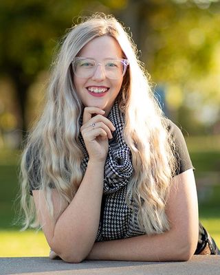 Photo of Taylor Jackson - Distress Demolisher, Registered Psychotherapist, BA, MA, RP