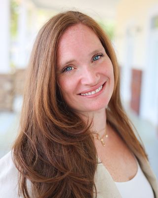 Photo of Ashley Ojok, Clinical Social Work/Therapist, LICSW, LCSW